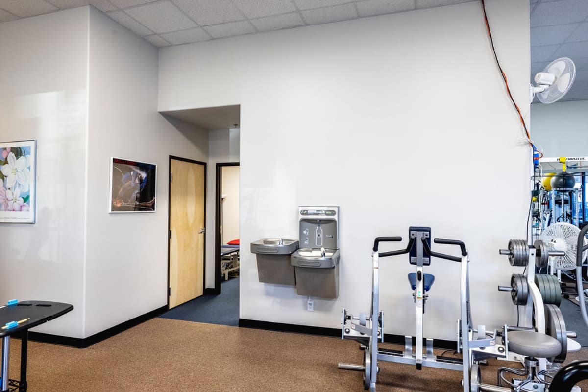 New patient drinking fountain installed at the edge of the clinic gym area